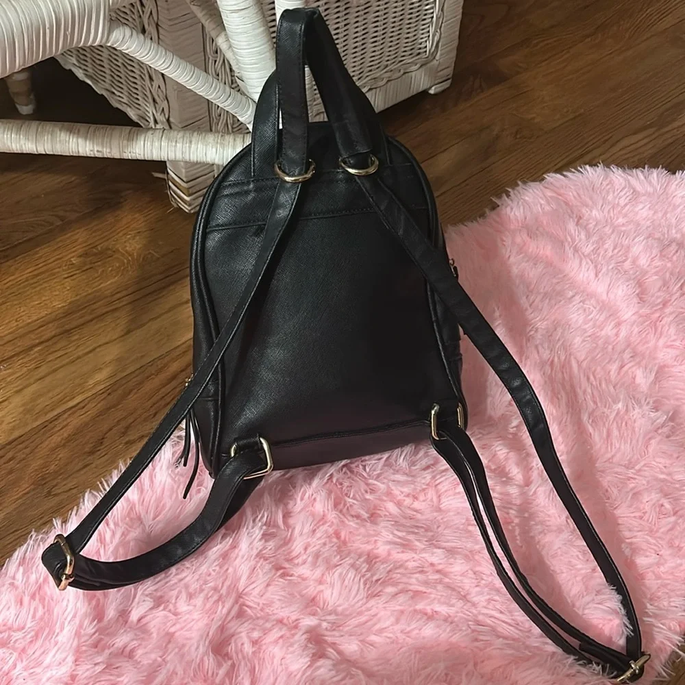 Fashion Inspired Black Leather Bucket Bookbag With Chain Detail